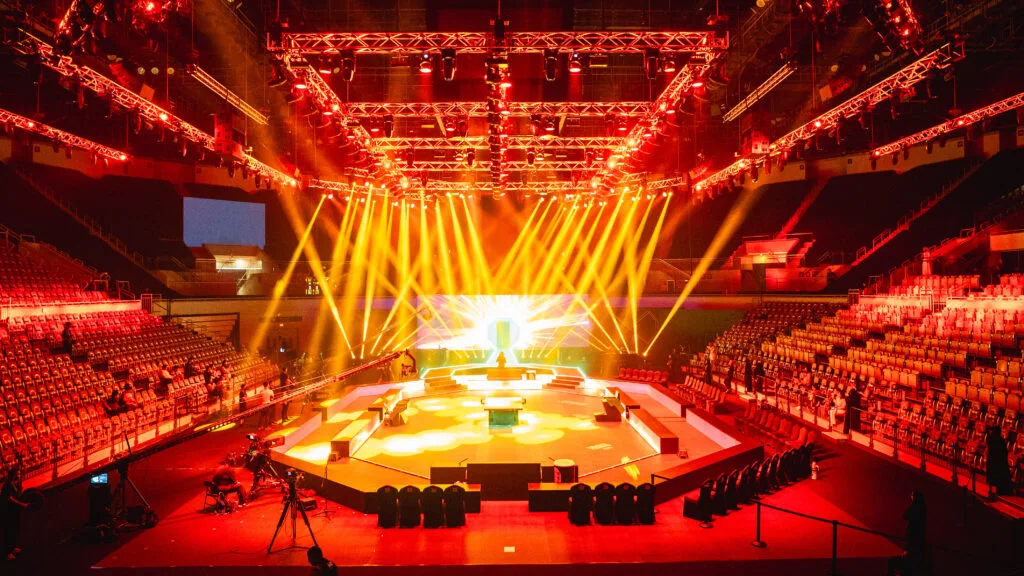 Arena stage, bright lights.