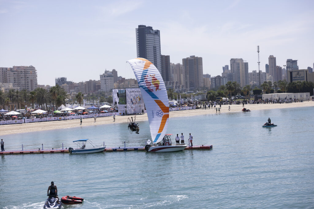 Powered paragliding water landing.