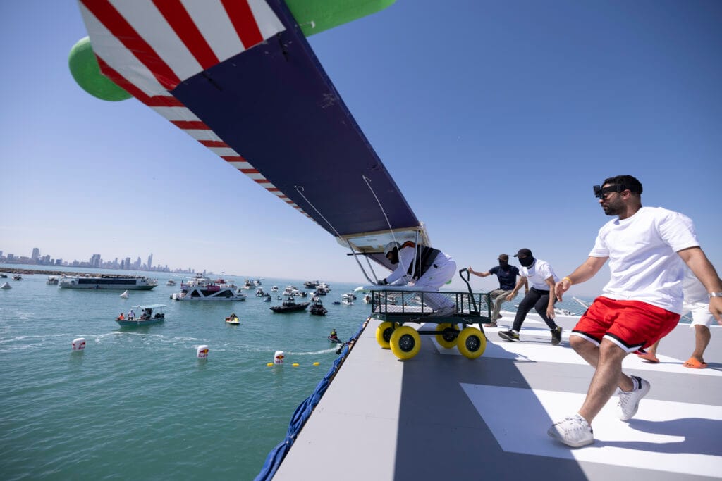 Hang glider launch preparation.