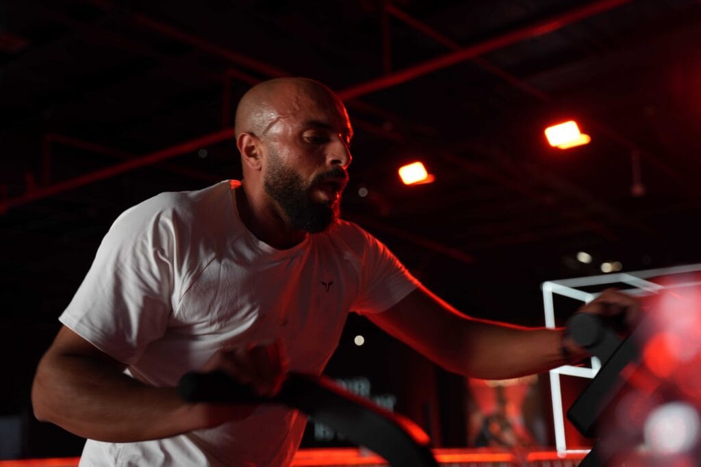 Man exercising on bike.