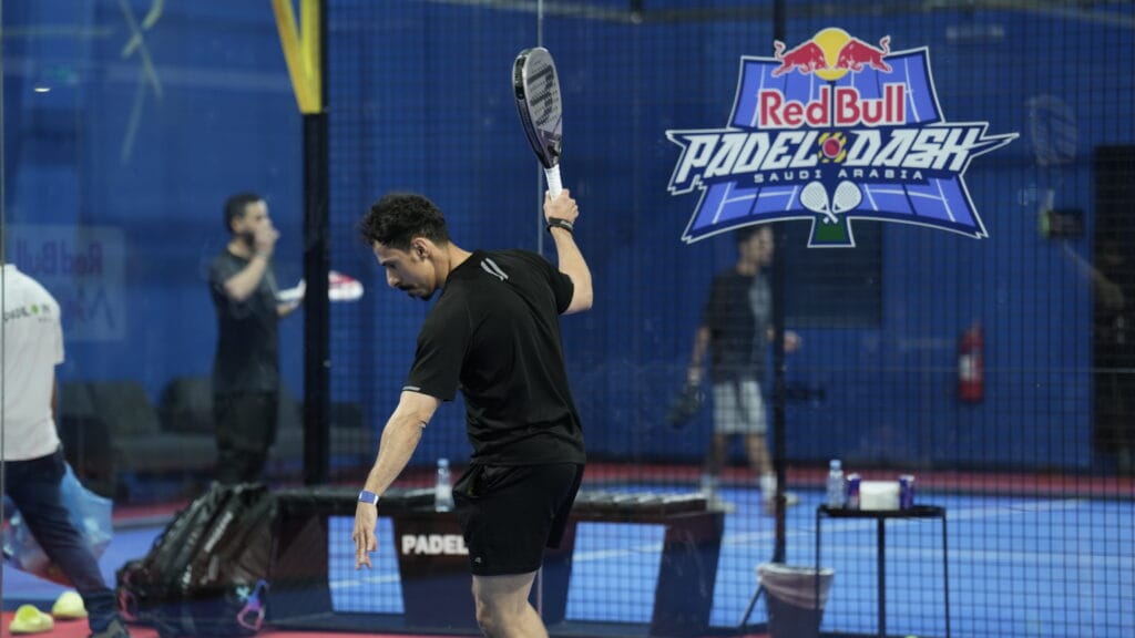 Man playing padel tennis.