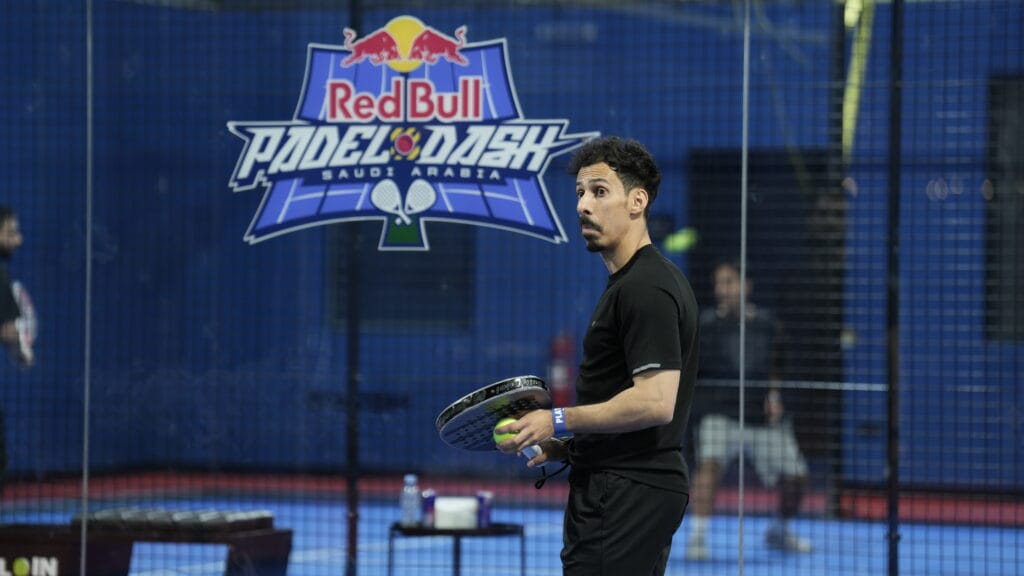 Padel player at Red Bull event.