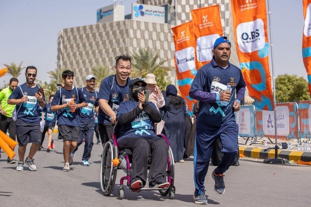 Riyadh Marathon, with various race distances available, including the Full Marathon (42,195 km) and Half Marathon (21,0975 km), and more than 15,000 individuals of all fitness levels. Organized by Blink Experience.