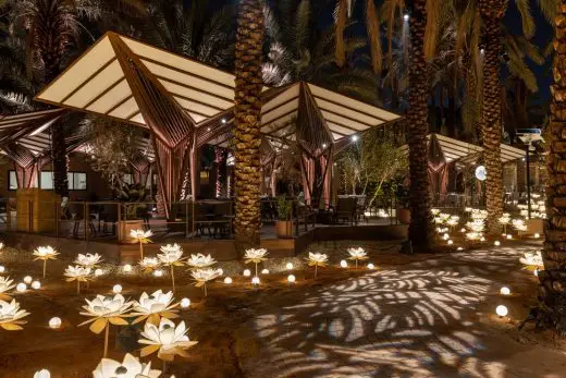 Nighttime oasis, illuminated patio.